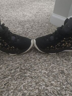 Women’s Black Knit Athletic Sneakers with Gold Accent